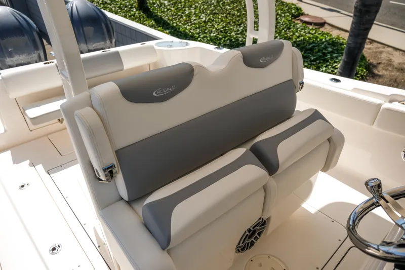 Slide: The Image of 2023 Robalo R302 Center Console boat seating with gray and white upholstery. - 26