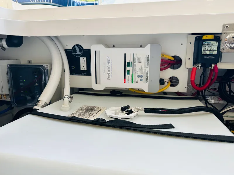 Slide: The Image of Electrical system components inside a 2021 Back Cove 34O boat. - 19