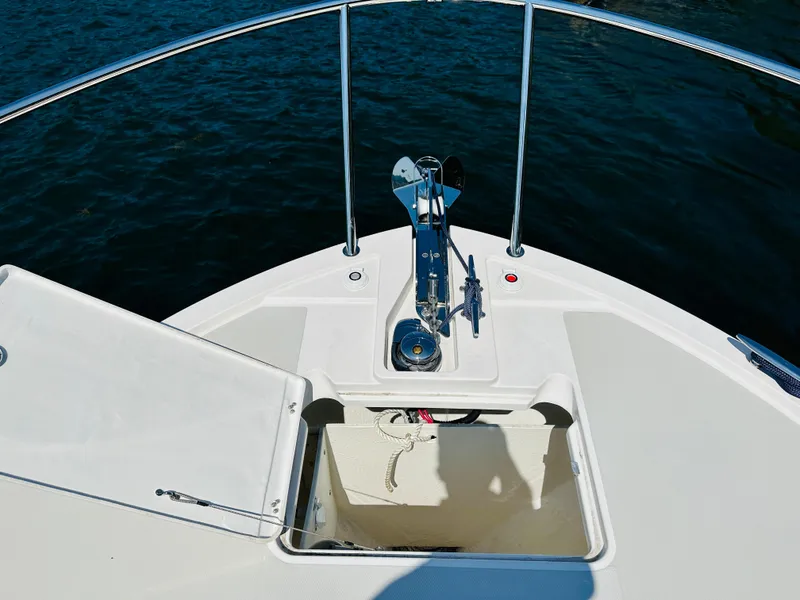 Slide: The Image of Bow of 2021 Back Cove 34O boat with anchor and storage compartment. - 9