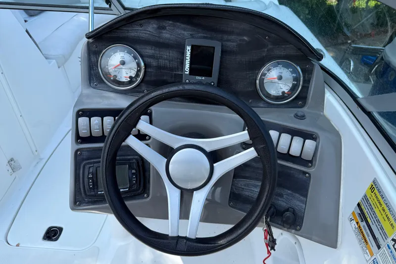 Slide: The Image of Steering wheel and dashboard of 2016 Hurricane SunDeck 2200 DC OB boat. - 15