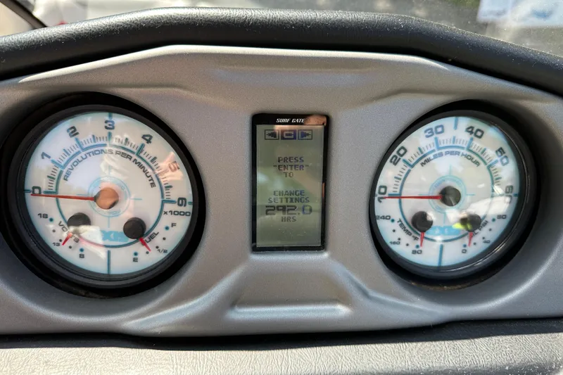 Slide: The Image of Dashboard of a 2018 Axis T22 boat showing RPM, speed, and digital display. - 11