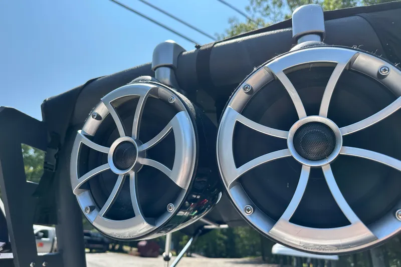 Slide: The Image of Close-up of Axis T22 2018 boat speakers under a clear blue sky. - 17