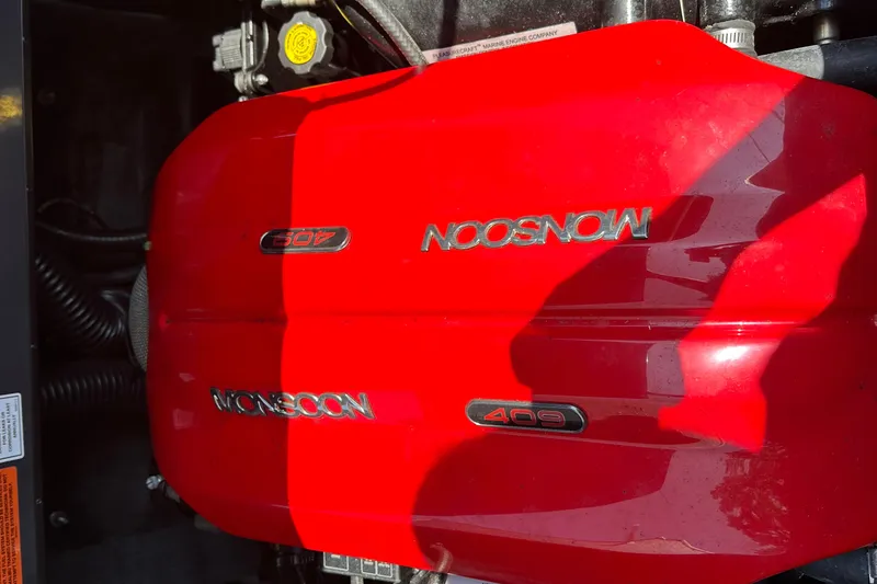 Slide: The Image of Red Monsoon 409 engine in a 2018 Axis T22 boat. - 18