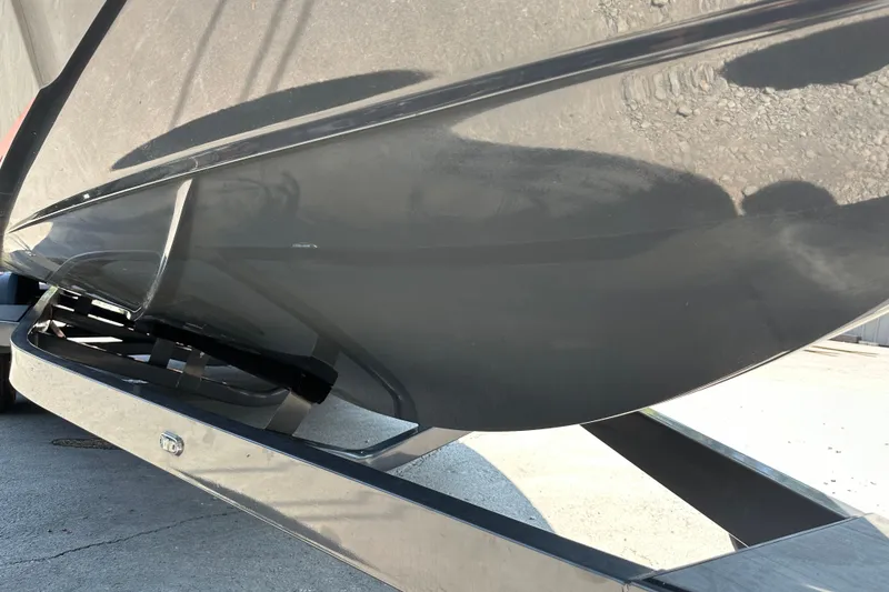 Slide: The Image of 2018 Axis T22 boat hull on trailer, close-up view. - 19