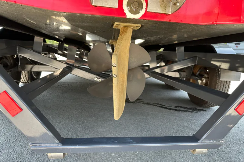 Slide: The Image of 2018 Axis T22 boat propeller and trailer underside view. - 5