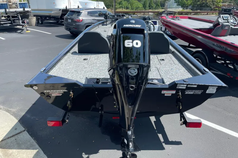 Slide: The Image of 2026 Tracker Pro Team 175 Tournament Edition boat with Mercury 60 engine in parking lot. - 3