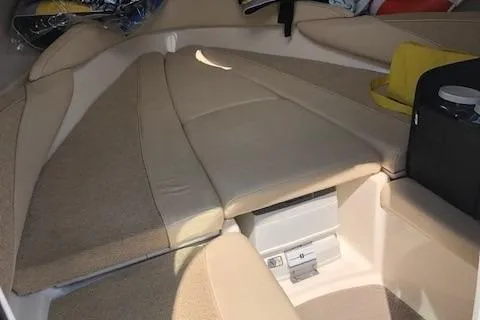 Slide: The Image of Interior cabin of 2002 Maxum 2100 SC boat with beige seating. - 9