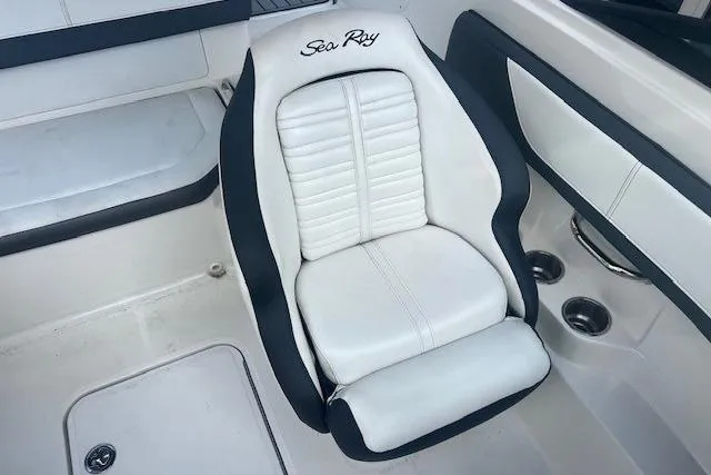 Slide: The Image of White and black seat in 2018 Sea Ray 19 SPX OB boat interior. - 12