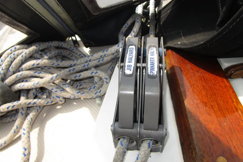 Slide: The Image of Jib and spinnaker halyard cleats on 1989 Catalina 36 sailboat deck. - 33
