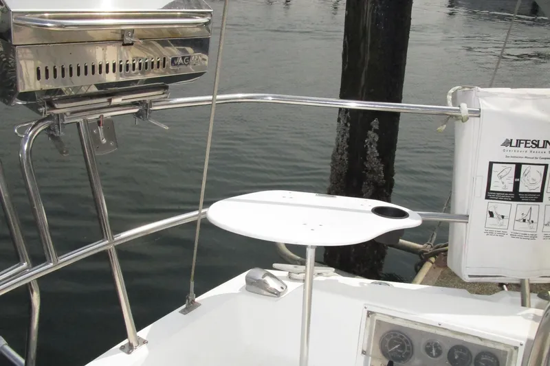 Slide: The Image of Catalina 36 sailboat cockpit with grill and lifesaving equipment, 1989 model. - 5