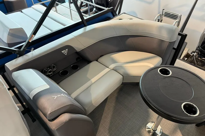 Slide: The Image of Luxurious seating area in 2026 Viaggio Lago X-U boat with cup holders and table. - 11