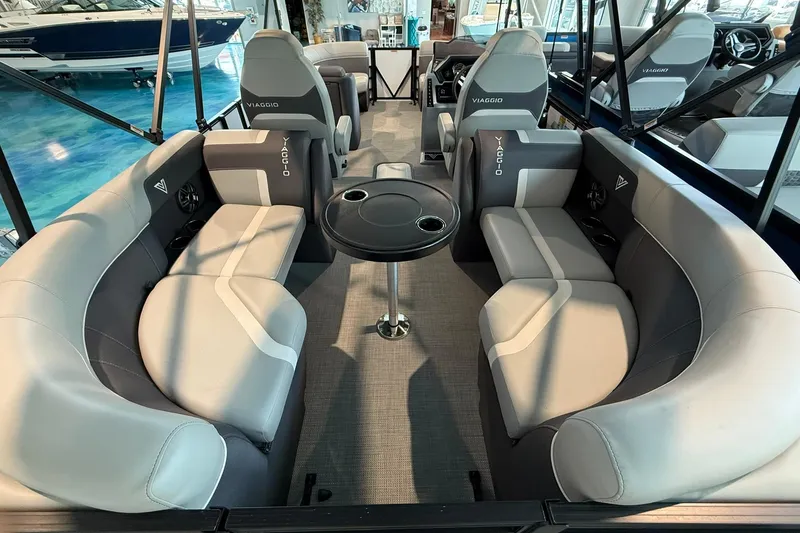 Slide: The Image of Luxurious interior of 2026 Viaggio Lago X-U boat with plush seating and table. - 15