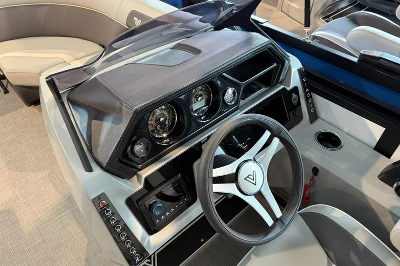 Slide: The Image of 2026 Viaggio Lago X-U boat dashboard with modern steering wheel and instrument panel. - 6