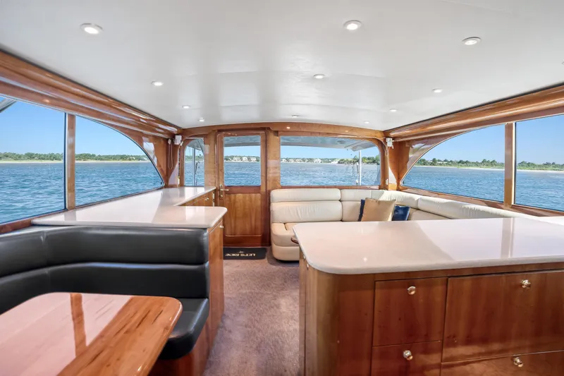 Slide: The Image of Luxurious interior of 2004 Sculley Custom Carolina 58' Sportfish yacht with elegant wood finishes. - 25