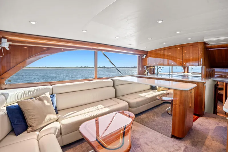 Slide: The Image of Luxurious interior of 2004 Sculley Custom Carolina 58' Sportfish yacht with elegant seating and ocean view. - 26