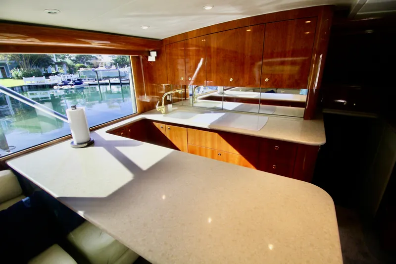 Slide: The Image of Luxurious kitchen interior of 2004 Sculley Custom Carolina 58' Sportfish yacht. - 30