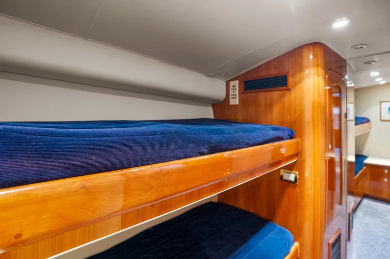 Slide: The Image of Interior of 2004 Sculley Custom Carolina 58' Sportfish with wooden bunk beds. - 42