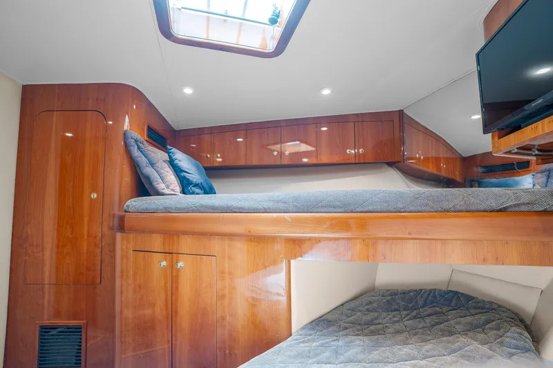Slide: The Image of Luxurious cabin interior of 2004 Sculley Custom Carolina 58' Sportfish yacht. - 52