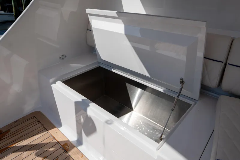 Slide: The Image of Open storage compartment on 2004 Sculley Custom Carolina 58' Sportfish boat. - 67