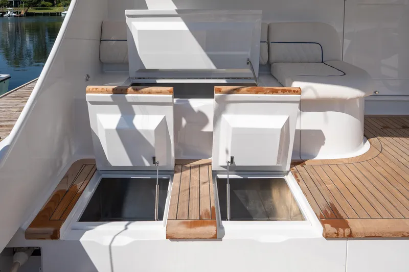 Slide: The Image of Luxury 2004 Sculley Custom Carolina 58' Sportfish yacht deck with open storage compartments. - 68