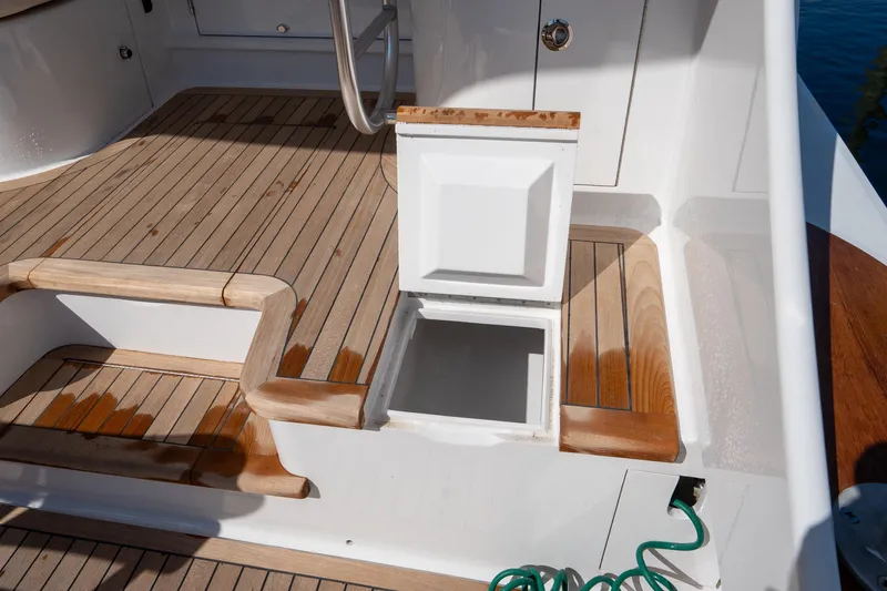 Slide: The Image of Open storage compartment on 2004 Sculley Custom Carolina 58' Sportfish boat deck. - 70