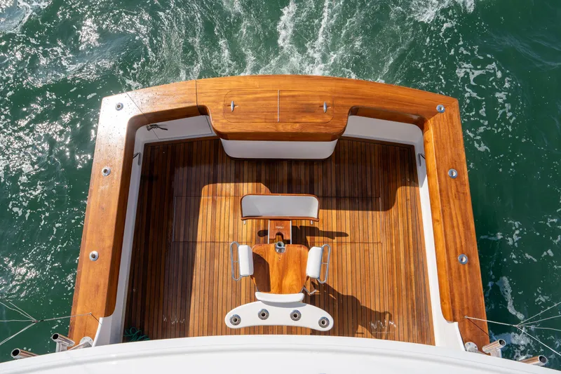 Slide: The Image of Aerial view of 2004 Sculley Custom Carolina 58' Sportfish deck with wooden finish. - 9