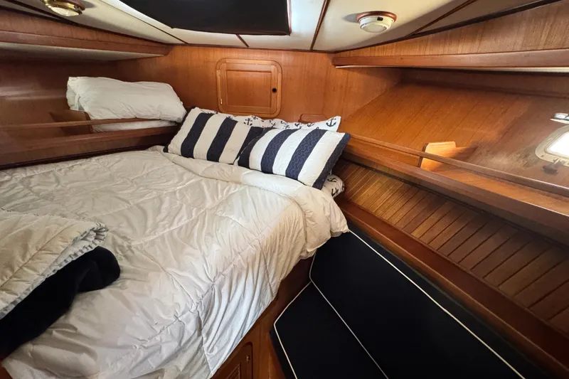Slide: The Image of Cozy cabin interior of 1999 Heritage East Sundeck 36 with nautical decor. - 23