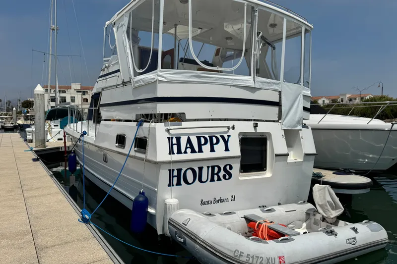 Slide: The Image of 1999 Heritage East Sundeck 36 yacht named "Happy Hours" docked in Santa Barbara marina. - 4