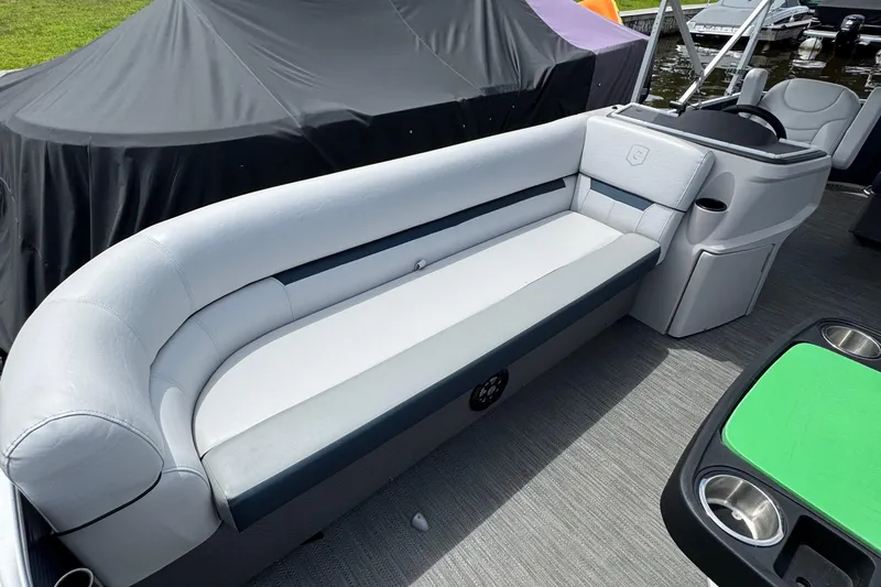 Slide: The Image of 2022 Godfrey Sweetwater 2186 C pontoon boat interior with sleek seating and modern design. - 4