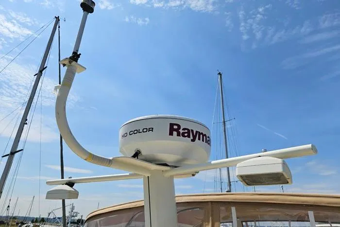 Slide: The Image of Radar equipment on 2007 Mainship 34 Trawler against a clear blue sky. - 21