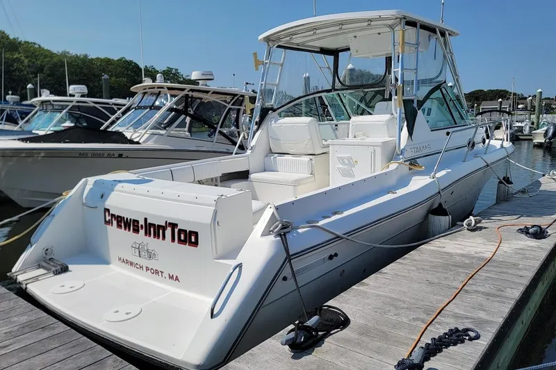 Slide: The Image of 2000 Stamas 310 Express boat docked at marina, Harwich Port, MA. - 15