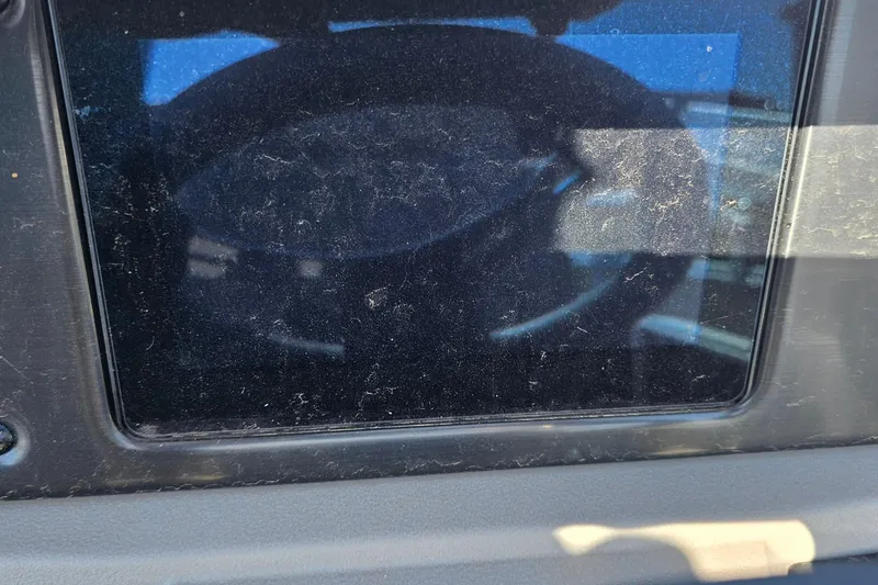 Slide: The Image of Dusty dashboard screen of a 2024 Sun Tracker SportFish 20 DLX boat. - 14