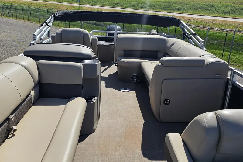 Slide: The Image of 2024 Sun Tracker SportFish 20 DLX pontoon boat interior with spacious seating and modern design. - 4