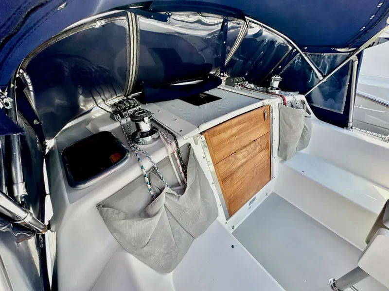 Slide: The Image of Cockpit of 2005 Catalina 36 sailboat with winches and wooden hatch. - 22