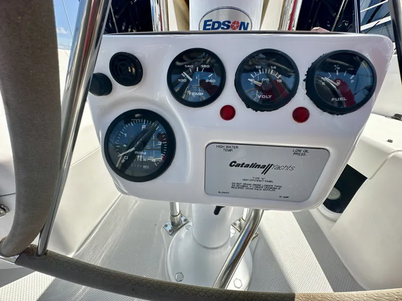 Slide: The Image of Instrument panel of a 2005 Catalina 36 yacht, featuring gauges and controls. - 31