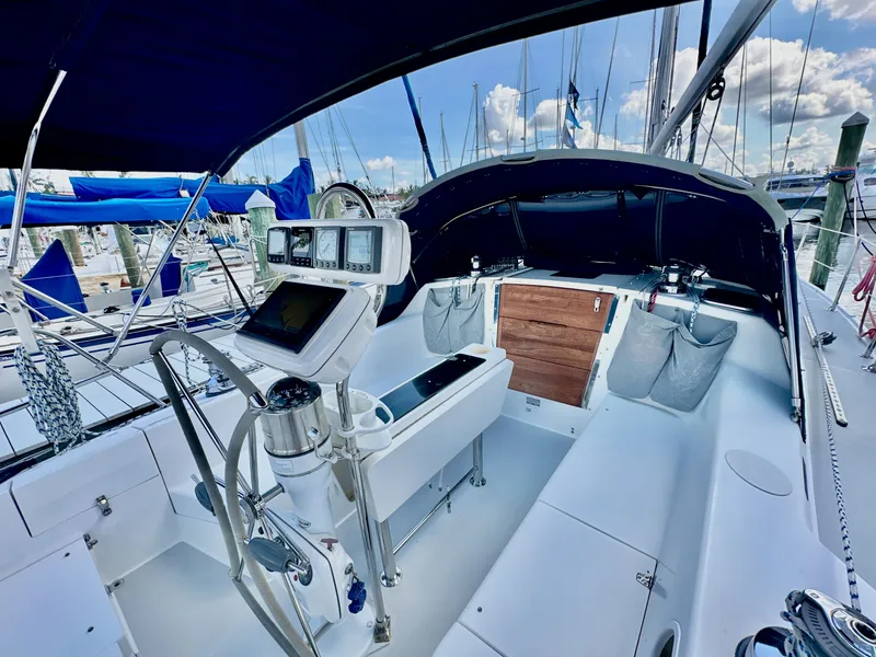 Slide: The Image of Cockpit of 2005 Catalina 36 sailboat with navigation equipment and seating. - 32