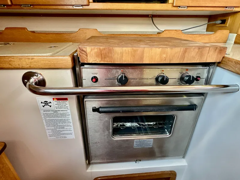 Slide: The Image of Catalina 36 yacht kitchen oven with wooden countertop, 2005 model. - 42