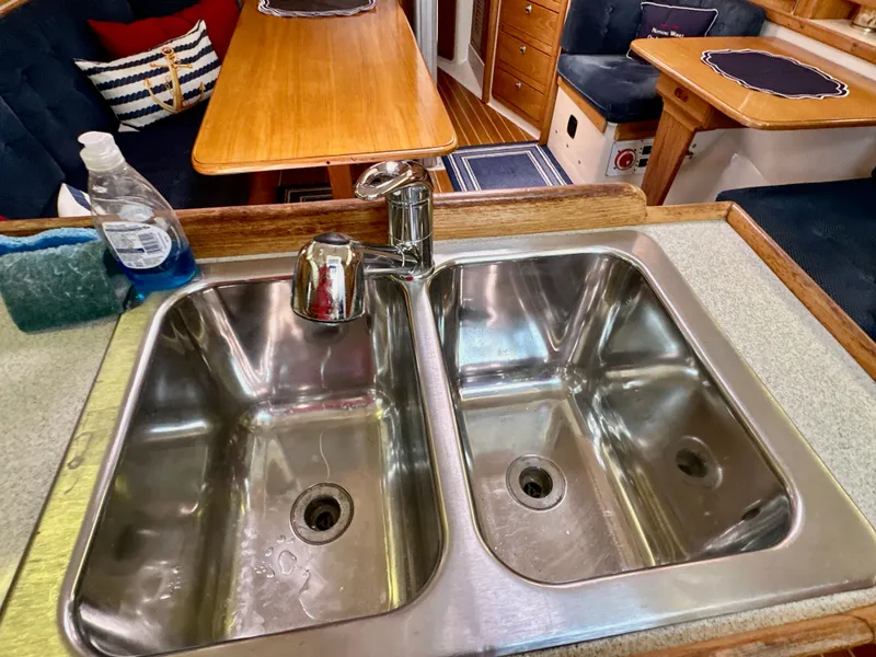 Slide: The Image of Stainless steel double sink in 2005 Catalina 36 yacht kitchen interior. - 46