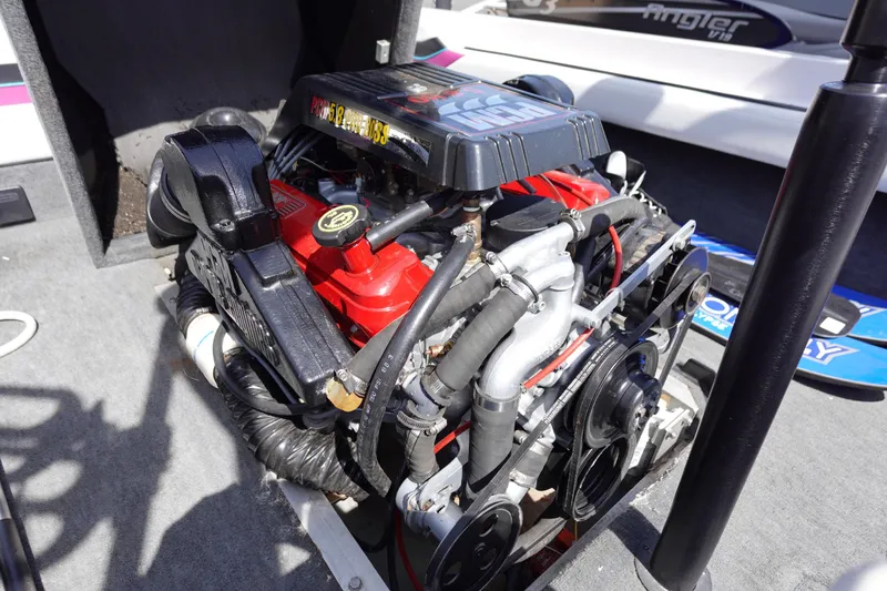 Slide: The Image of 1993 Correct Craft Ski Nautique 200 engine, showcasing detailed components and design. - 13