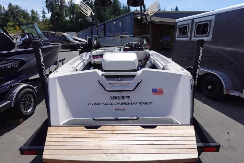 Slide: The Image of 1993 Correct Craft Ski Nautique 200 Closed Bow boat, rear view, on trailer. - 16
