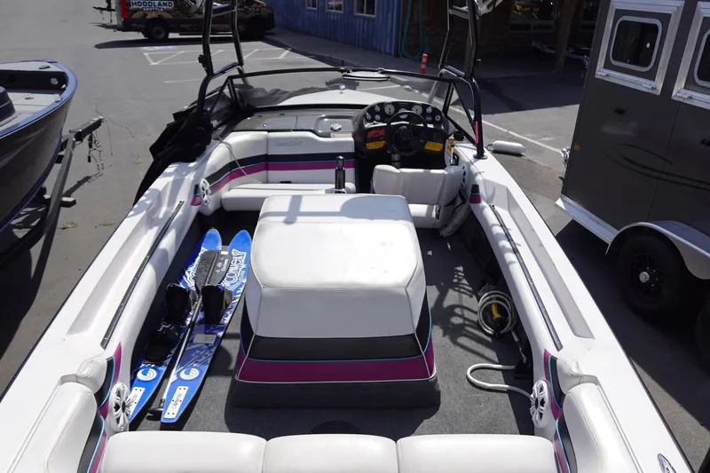 Slide: The Image of 1993 Correct Craft Ski Nautique 200 boat interior with water skis and seating. - 17