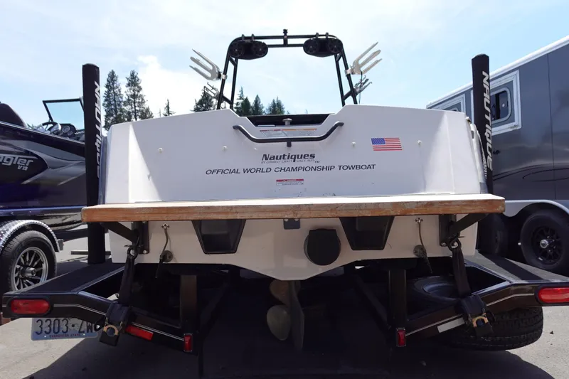 Slide: The Image of 1993 Correct Craft Ski Nautique 200 Closed Bow, official world championship towboat, rear view. - 4