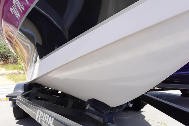 Slide: The Image of 1993 Correct Craft Ski Nautique 200 boat on trailer, close-up view of hull. - 6