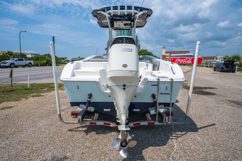 Slide: The Image of 2021 Sea Pro 239 Center Console boat with powerful outboard motor on trailer. - 7