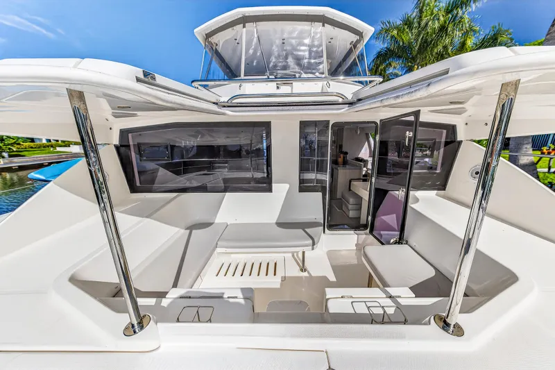 Slide: The Image of 2018 Leopard 51 Powercat yacht with spacious seating and modern design. - 12