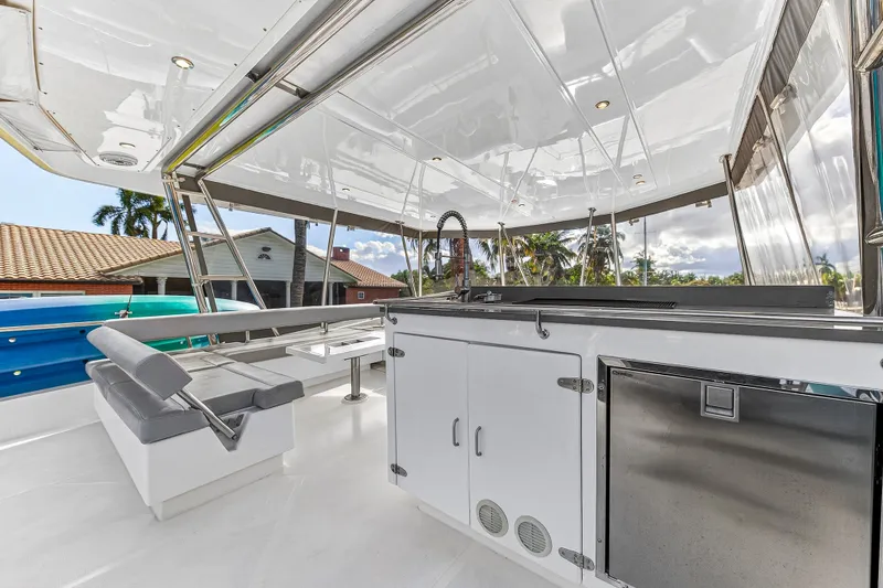 Slide: The Image of 2018 Leopard 51 Powercat yacht interior with sleek kitchen and seating area. - 17