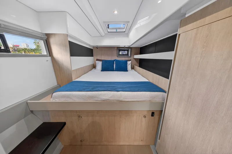 Slide: The Image of Luxurious cabin interior of 2018 Leopard 51 Powercat with modern design and comfortable bedding. - 24