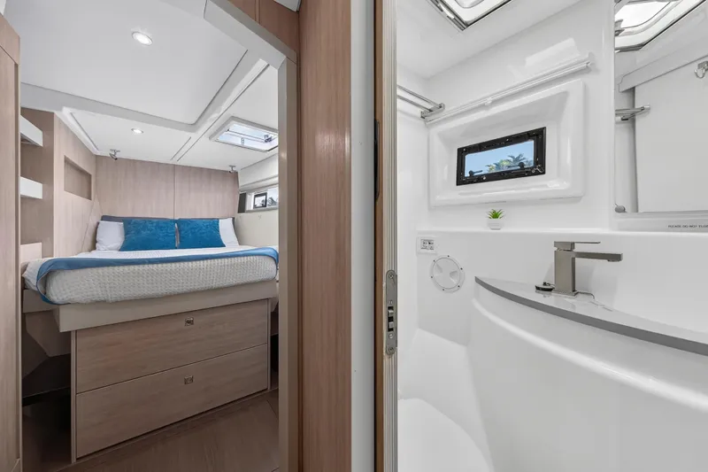 Slide: The Image of Luxurious interior of 2018 Leopard 51 Powercat with bedroom and modern bathroom. - 26