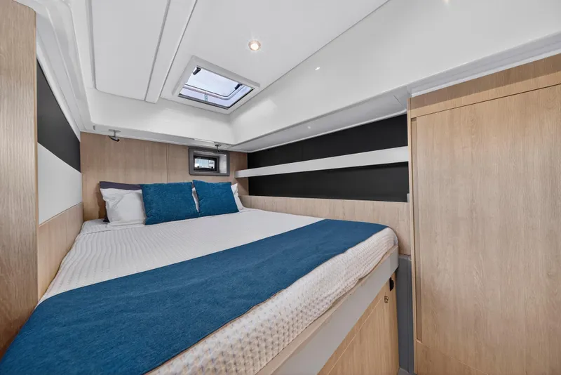 Slide: The Image of Luxurious bedroom interior of 2018 Leopard 51 Powercat with modern design and skylight. - 28