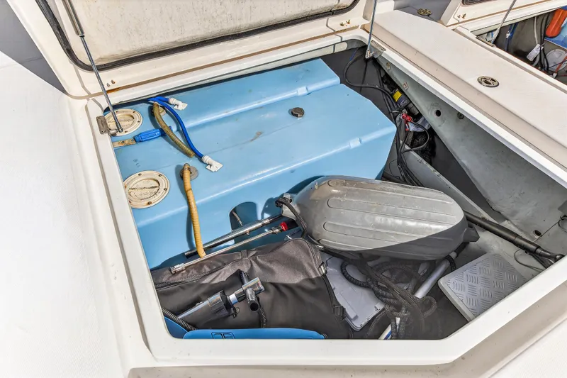 Slide: The Image of Engine compartment of 2018 Leopard 51 Powercat with blue tank and various components. - 52